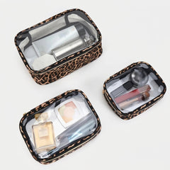 BELLEROPHON - Trousse de Toilette Transparente Léopard